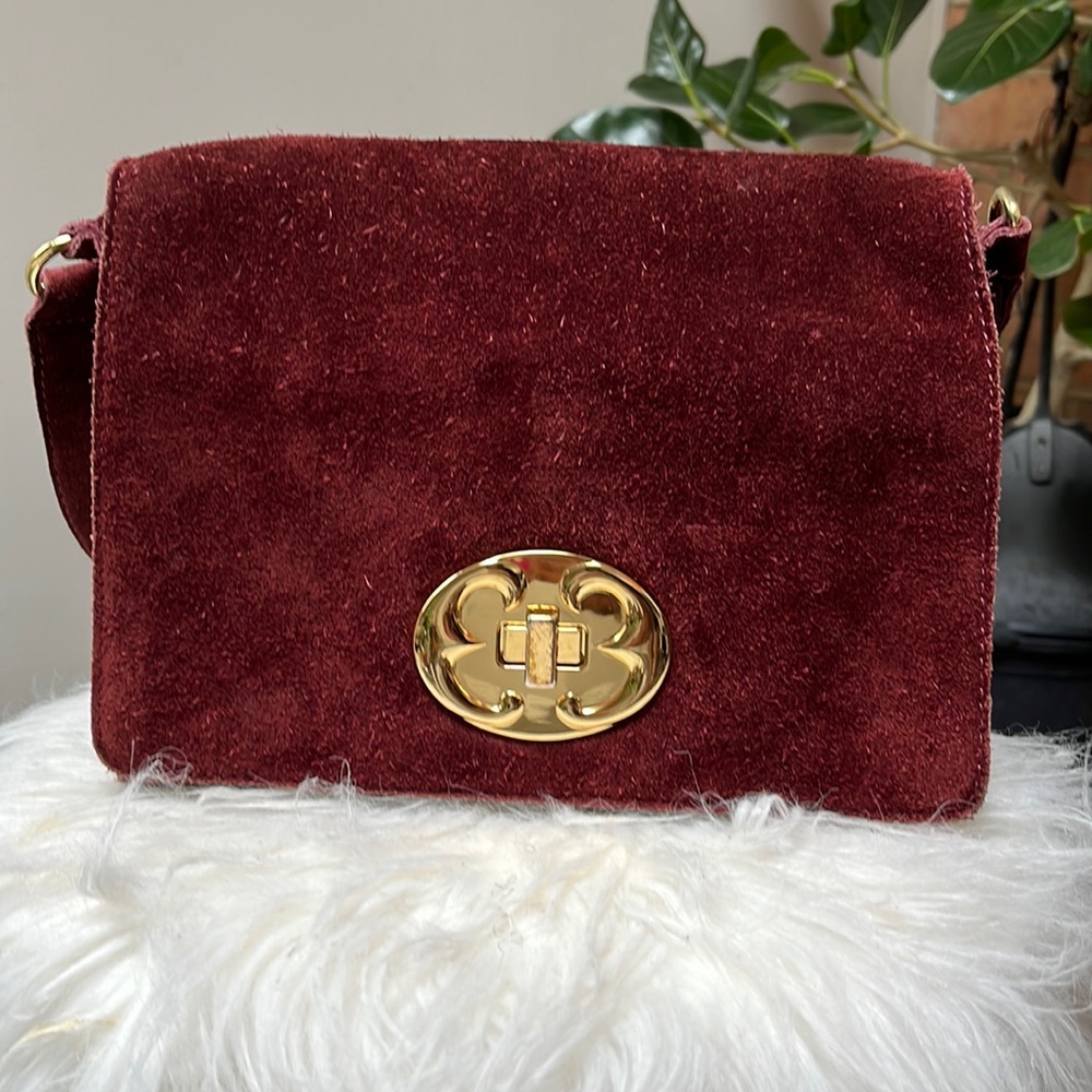 Emma Fox suede leather purse with gold lock closure and extra crossbody strap.